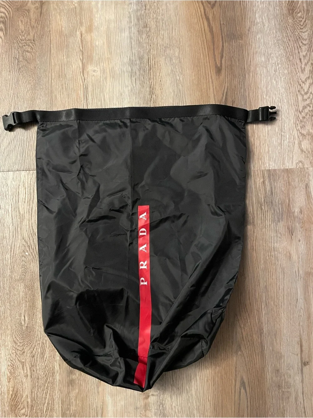 Prada Black Nylon Duffel with Vertical Red Logo Stripe